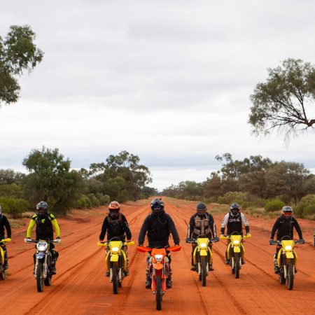 A group of dirt bike riders on a dirt bike tour
